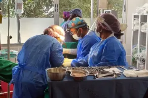Surgeons during an operation at J.J. Dossen Memorial Hospital in Maryland County, Liberia. 