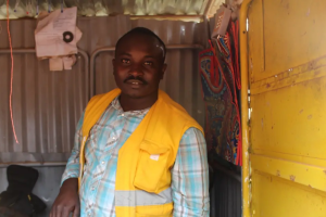 Shop owner near Butaro district hospital in Rwanda