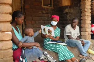 Community health worker Catherine Benito visits a household in Neno District, Malawi.