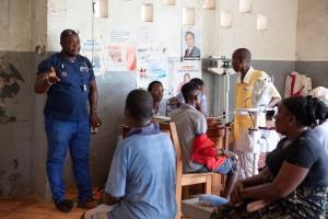 Physician's assistant and patients at J.J. Dossen Hospital in Harper, Liberia.