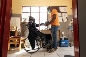 Qacha Qabane during an examination with Registered Nurse Thuso Ntsapi at Nkau Health Center in Mohale's Hoek District, Lesotho.