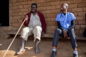 PIH’s non-communicable disease (NCD) team visits Richard Mavuto and his family at their home in Chidakusani