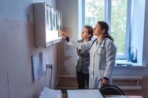 Doctors look at xrays of TB
