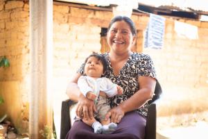 Mother holds son in Chiapas, Mexico