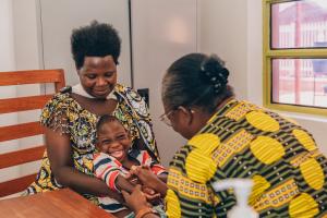 n a therapy session, Valentine works with Itangishaka Cecile, a PIH staff member and PDC Psychosocial and Community Support Coordinator