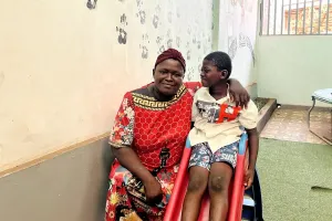 Juliet Thomas (left) with her 6-year-old son Hassan (right). Thomas brings Hassan to the Child and Adolescent Mental Health unit for support with managing his behavior and emotions. 