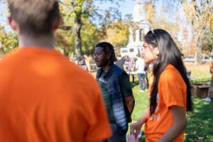 PIH trustee and former patient Ancito Etienne (centre) joins students for a Global Day of Action in Cambridge, MA.