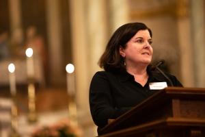 PIH CEO Dr. Sheila Davis speaks at a remembrance ceremony of the Haiti earthquake