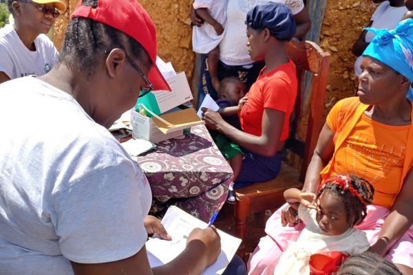 Nurses in Haiti with young patients 
