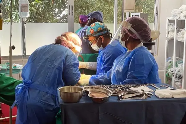 Surgeons during an operation at J.J. Dossen Memorial Hospital in Maryland County, Liberia. 