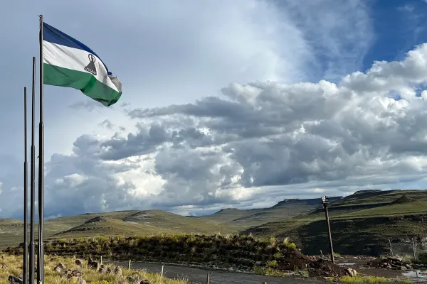 Lesotho flag flies over the highlands. 