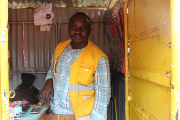 Shop owner near Butaro district hospital in Rwanda