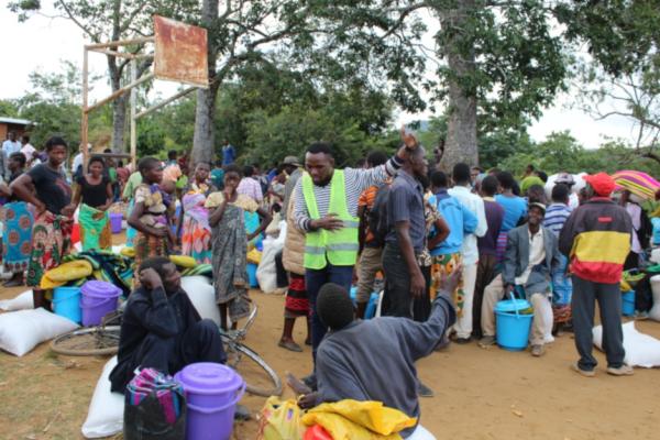 PIH Malawi manager talking to people in Neno District