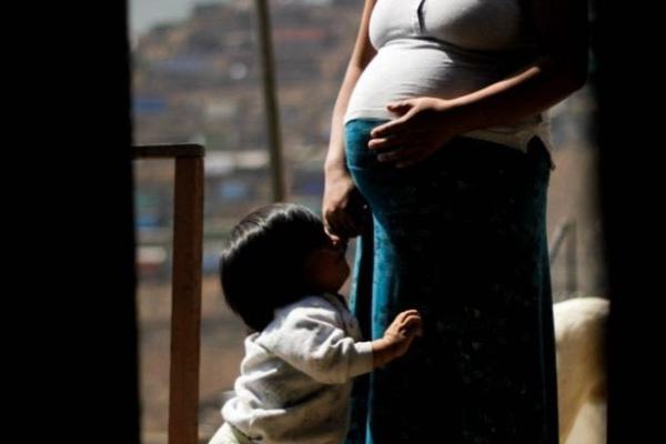 Isabel from Peru with her baby