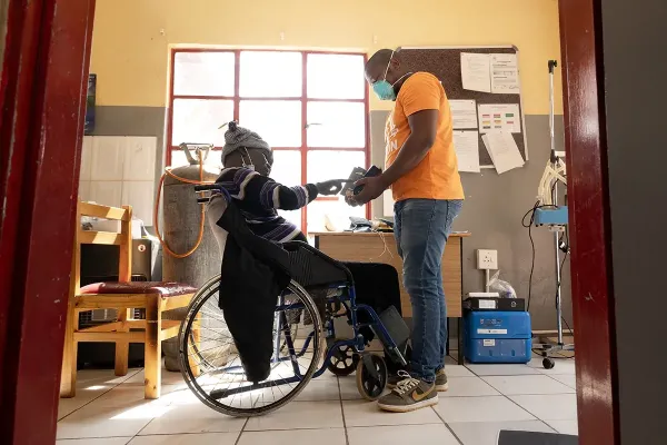 Qacha Qabane during an examination with Registered Nurse Thuso Ntsapi at Nkau Health Center in Mohale's Hoek District, Lesotho.
