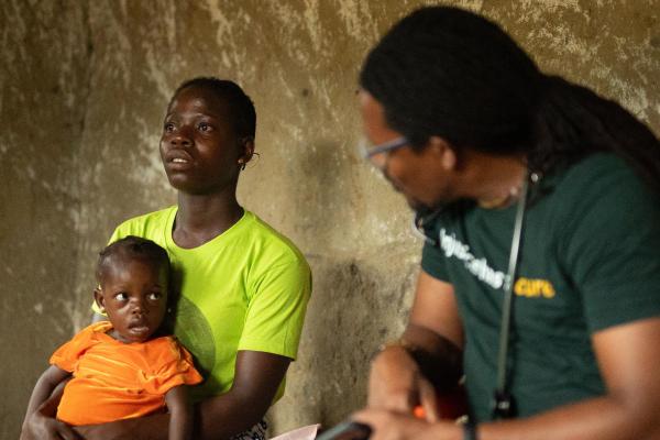 Agatha and Pauline met Dr. Maxo Luma, executive director of PIH Liberia