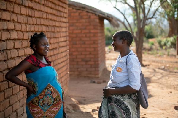 CHW talks to pregnant mother