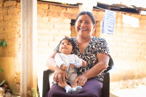 Mother holds son in Chiapas, Mexico