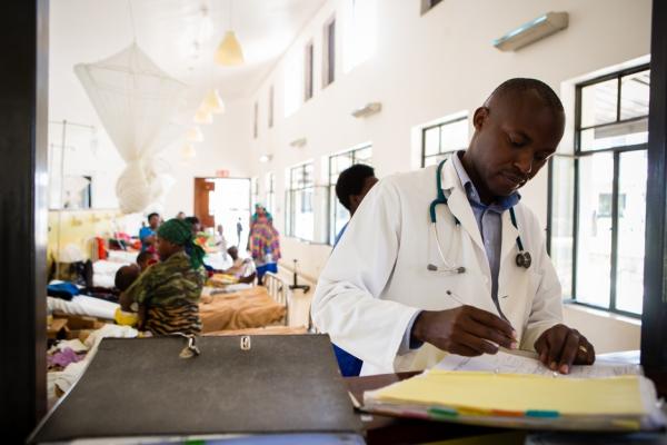 oncology program director for Partners In Health in Rwanda records medical information