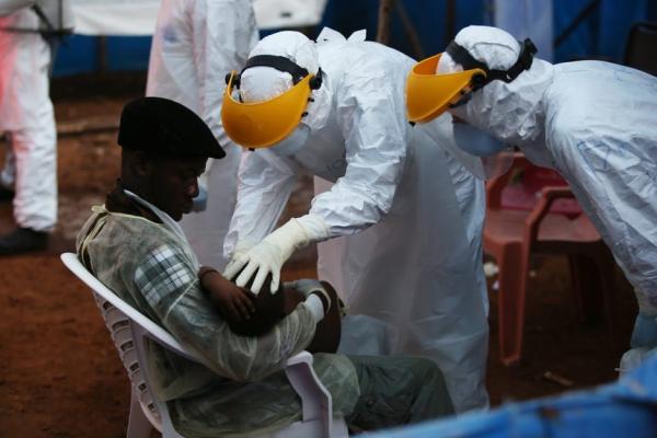 PIH clinicians care for a 3-year-old boy in Sierra Leone