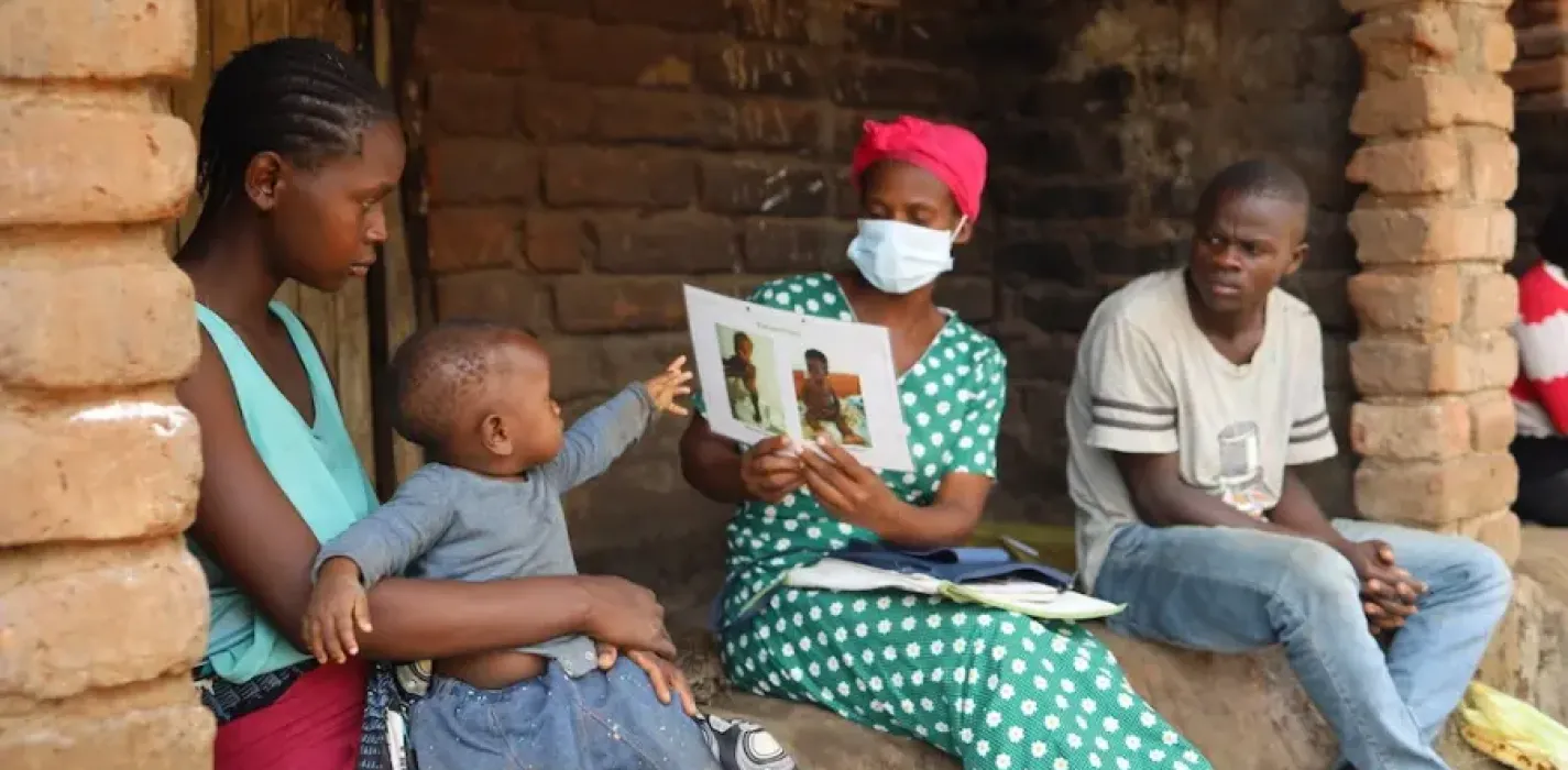 Community health worker Catherine Benito visits a household in Neno District, Malawi.