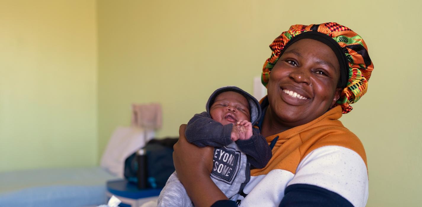 ‘Mampho Mojela with her new born baby Blessings Mojela inside the maternal waiting ward.