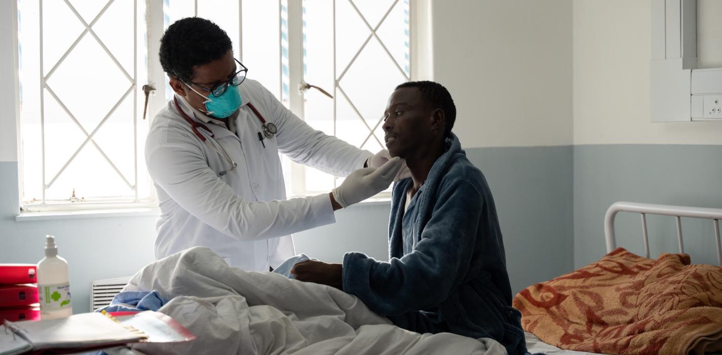 Dr. Eyob Deyaso Biyene examines MDR-TB patient Mokoto Kotelo during morning rounds.