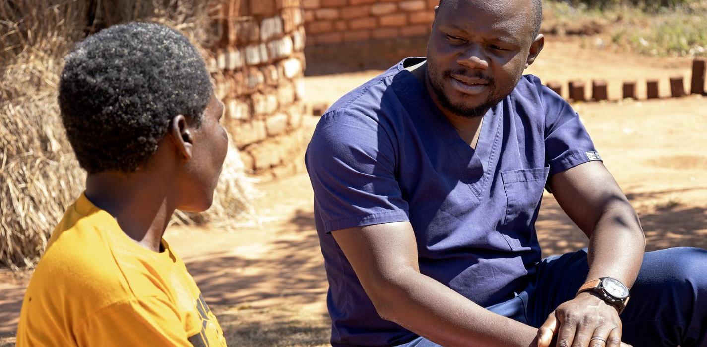 Dester Nakotwa, NCD Nurse, counseling Vitalina Chaona,