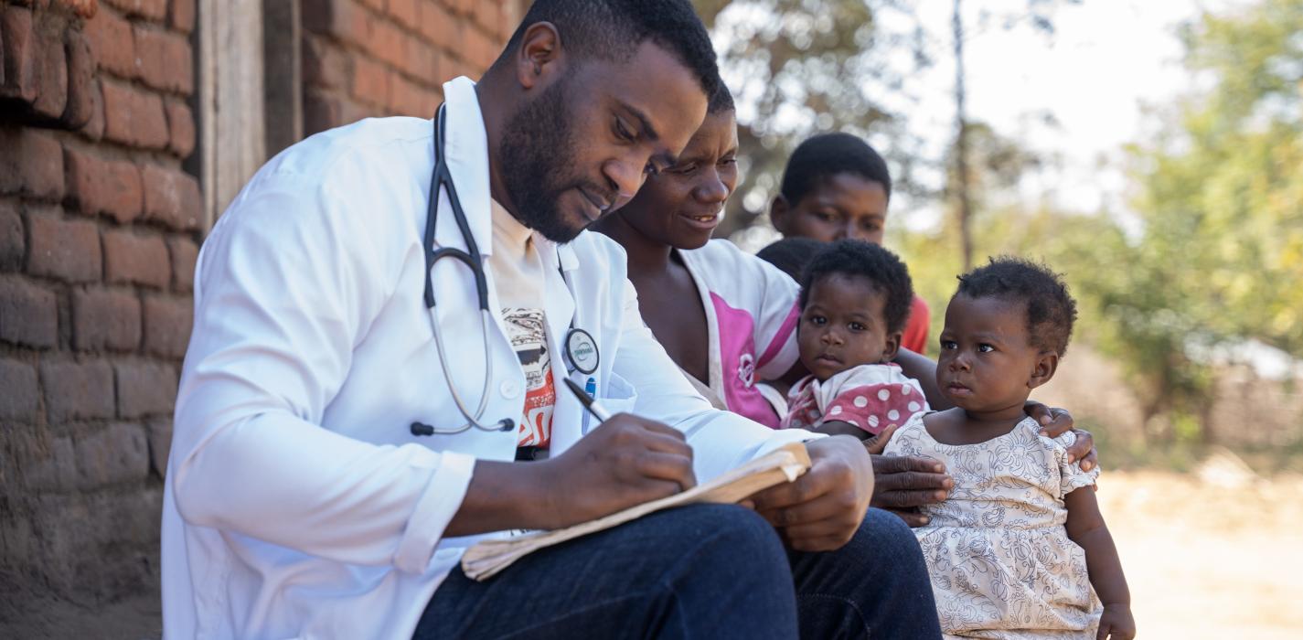 Clinical Officer with children