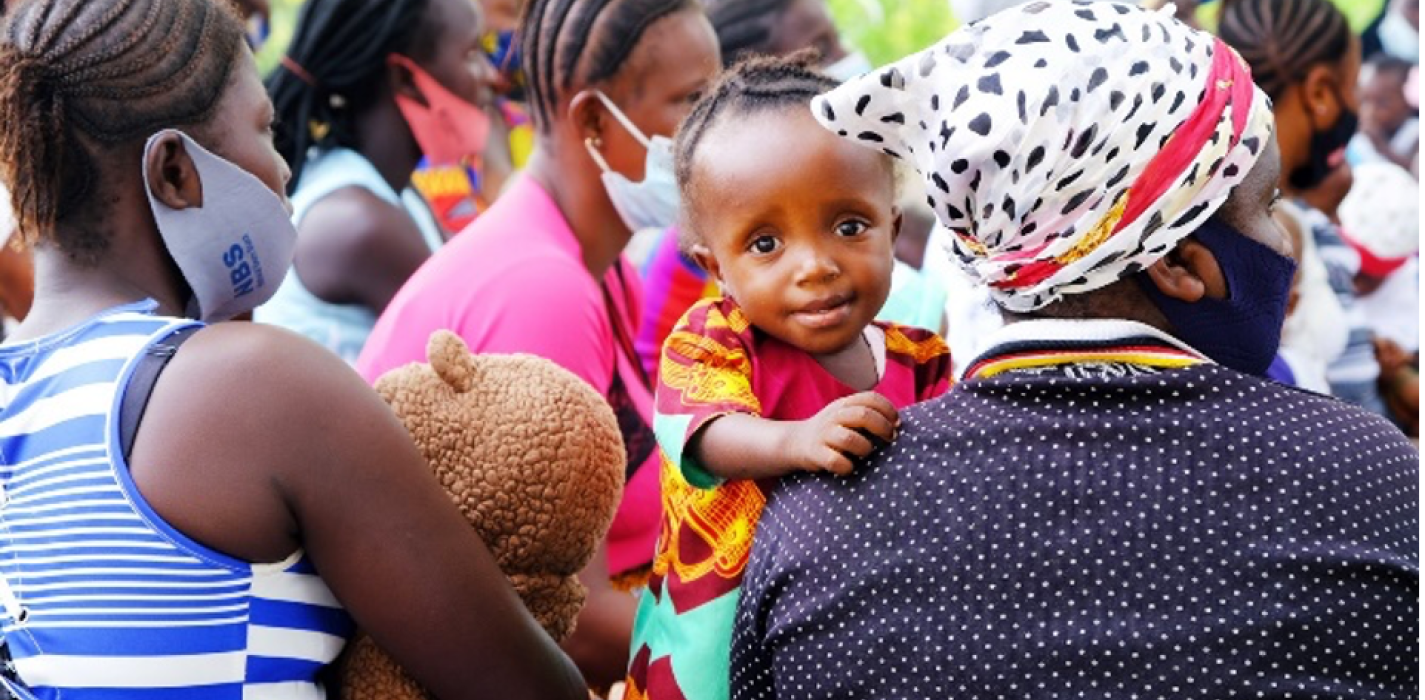 Mother holding child