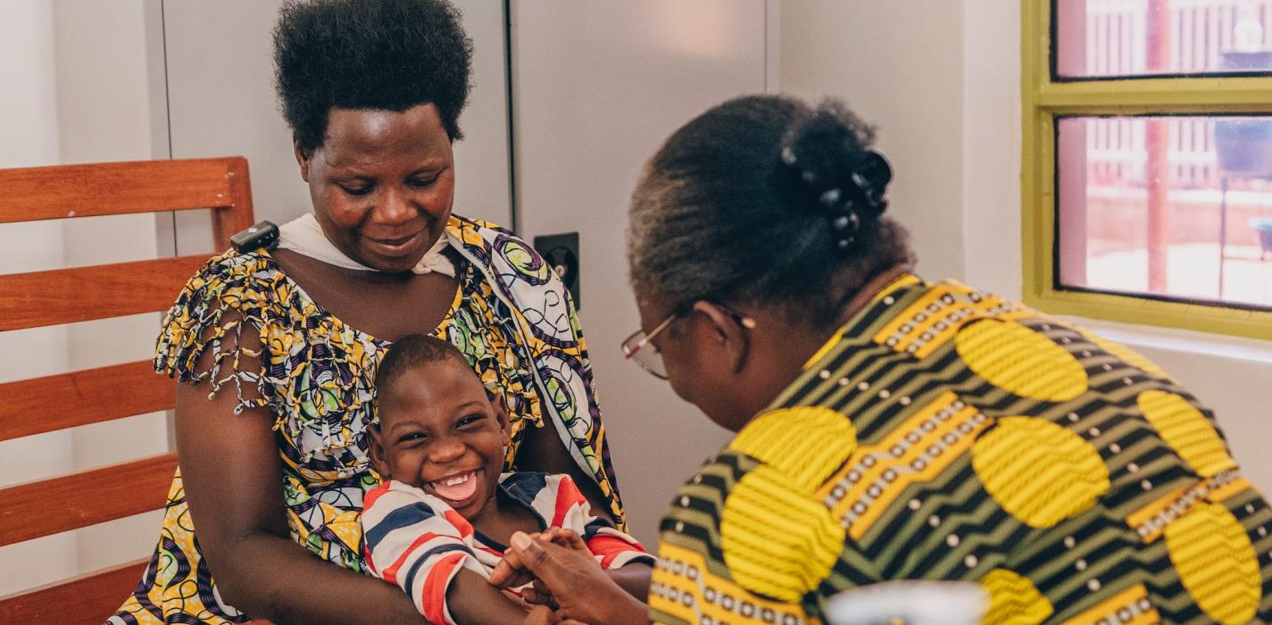n a therapy session, Valentine works with Itangishaka Cecile, a PIH staff member and PDC Psychosocial and Community Support Coordinator