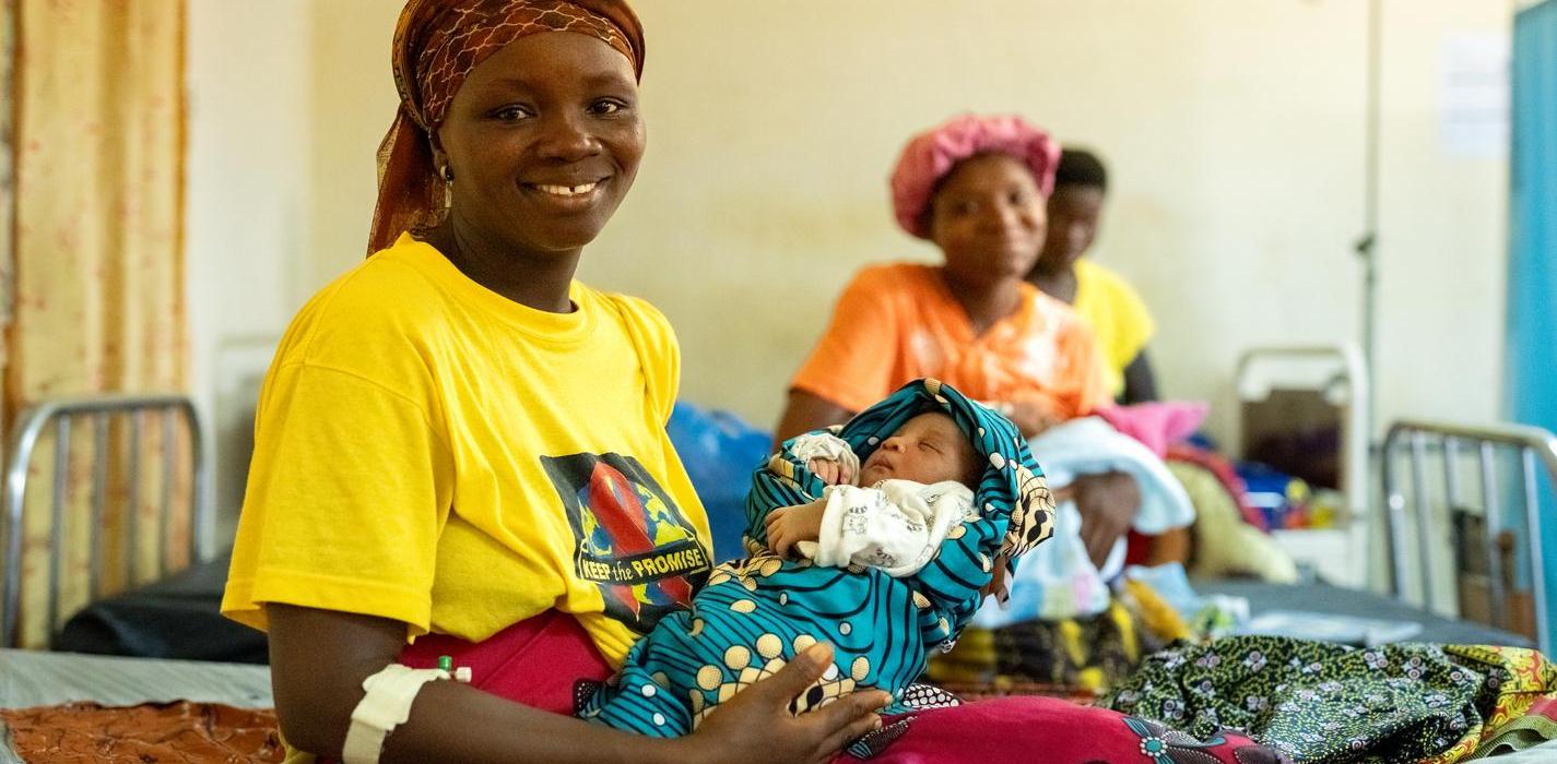 Kumba Sandy holds her newborn baby boy on the day they are being discharged to go home after giving birth at Koidu Government Hospital in Sierra Leone. She had been transferred to KGH due to complications during her pregnancy. This is her fifth child and fourth boy.
