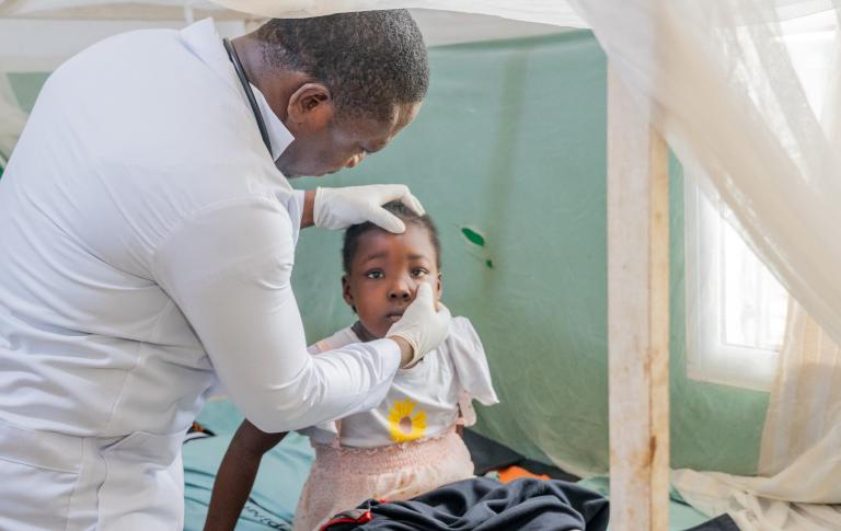 Dr. Beyan is checking on 8-years-old, Prayer Gaye who was diagnosed with Acute Nephrotic Syndrome