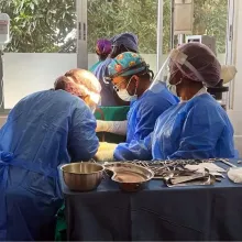 Surgeons during an operation at J.J. Dossen Memorial Hospital in Maryland County, Liberia. 