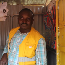 Shop owner near Butaro district hospital in Rwanda