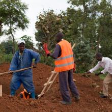 Workers at UGHE campus in Rwanda