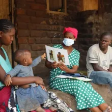 Community health worker Catherine Benito visits a household in Neno District, Malawi.