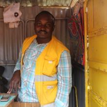 Shop owner near Butaro district hospital in Rwanda