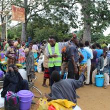 PIH Malawi manager talking to people in Neno District