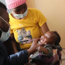 Nurse Mohlomi Maputle conducts a pediatric checkup. 