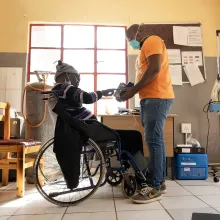 Qacha Qabane during an examination with Registered Nurse Thuso Ntsapi at Nkau Health Center in Mohale's Hoek District, Lesotho.