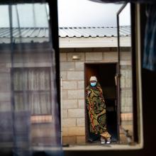 Molato Mahae, a patient with multidrug-resistant tuberculosis, awaits medication distribution at the halfway house in Maseru, Lesotho.