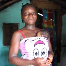 Mother holding her baby in Liberia