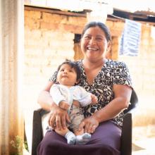 Mother holds son in Chiapas, Mexico