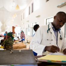 oncology program director for Partners In Health in Rwanda records medical information