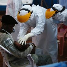 PIH clinicians care for a 3-year-old boy in Sierra Leone