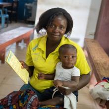 Elizabeth John with her 6-month-old boy Edward at the ‘under-5’ clinical at Wellbody Clinic in Kono district, Sierra Leone.