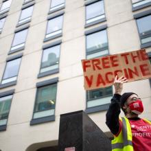 Supporters of the People’s Vaccine participate in a rally for global solidarity against vaccine apartheid.