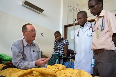 Dr. Farmer and Doctors Chiyembekezo Kachimanga and Noel Kalanga (left to right).
