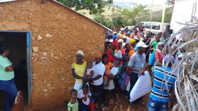 Families waiting to meet with nurses at a mobile malnutrition clinic